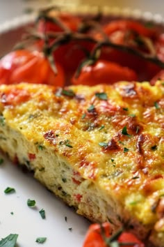 a close up of a slice of pizza on a plate with the words zucchini frittata above it