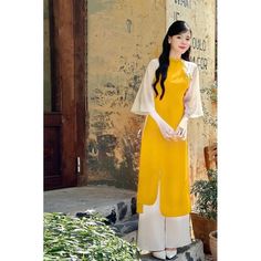 👉 7 DAY REFUND SUPPORT FOR CUSTOMERS IN VIETNAM * Still a Vietnamese girl walking down the street, how beautiful are her innovative ao dai. Selected from the best materials, the 4-piece modern ao dai will bring her the perfect experience. * With a delicate ao dai design in the flower-embroidered sleeves, a little bit of momentum with a stylized side part, this innovative ao dai can turn any girl into a beautiful lady. , young, lovely. * Ao dai in different colors such as pink and beige helps he Red Long Ao Dai For Summer, Traditional Red Ao Dai For Summer, Fitted Yellow Kurta For Spring, Yellow Fitted Kurta For Spring, Fitted Long Yellow Kurta, Yellow Fitted Long Kurta, Traditional Yellow Ao Dai, Yellow Long Sleeve Ao Dai For Summer, Yellow Fitted Traditional Ao Dai