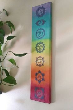 "SHOP OUR ETSY STORE FOR MORE UNIQUE ITEMS https://www.etsy.com/shop/mycraftcrayze Chakra wall hanging Size 5.5\" x 24\" This is a wooden sign with black sparkly decals and color accents under each chakra symbol. This wall hanging has a watercolor look to it. There is a keyhole in the back for hanging. If you have any questions please don't hesitate to ask. Chakras are our energy centers. They are the openings for life energy to flow into and out of our aura. Their function is to vitalize the Yoga Chakras Art, Easy Chakra Painting, Spiritual Canvas Art, Chakra Painting Ideas On Canvas, Chakra Painting Canvas, Chakra Art Painting, Chakra Painting Ideas, 7 Chakras Art, Chakras Painting