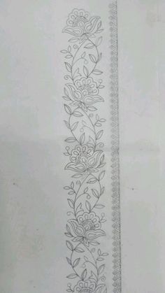 a line drawing with flowers and leaves on it in the middle of a piece of paper