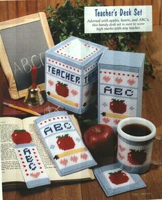 an advertisement for teacher's desk set, with apples and apple slices on it