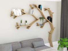 a living room filled with furniture and a tree shaped shelf