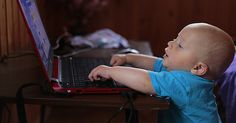 a baby playing on a laptop with the words what to say to online leads