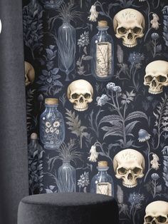 the wallpaper has skulls and flowers on it