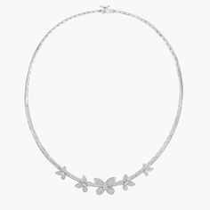 Beautifully articulated by Graff’s master artisans, this Pavé Butterfly diamond necklace, crafted in white gold, features five diamond butterflies which flutter along the collarbone. Inspiring a universe of jewels and timepieces, the Butterfly is an iconic emblem for Graff captured for eternity in precious diamonds and gemstones. A captivating Pavé Butterfly diamond necklace with a total approximate weight of 5.85 carats. Luxury Diamond White Flower-shaped Necklaces, Elegant Butterfly Necklace With Diamond Accents, Luxury Diamond Necklace With Pave Setting, Elegant White Gold Diamond Butterfly Necklace, Elegant White Gold Butterfly Necklace With Diamonds, Elegant Diamond Butterfly Necklace, Elegant Diamond Butterfly Necklace For Formal Occasions, Luxury Silver Butterfly Necklace For Formal Occasions, Elegant Silver Diamond Butterfly Necklace