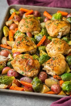 chicken and veggies on a sheet pan