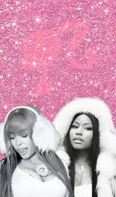 two women standing next to each other in front of a pink background with snow flakes