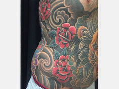 Peony tattoo, tiger ink, side tattoo design, floral and animal tattoo, traditional Japanese tattoo, vibrant color ink, botanical tattoo art, fierce tiger tattoo, peony symbolism, Asian-inspired body art. Tiger Side Tattoo, Japanese Tattoo Designs, Side Tattoos, Japanese Tattoo, Peonies, Contrasting Colors, Tattoo Designs