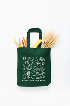 grow your own veggies and grocery haul in style with this groovy green "grow your own food!" tote bag! made from durable fabric, it's a must-have for any gardening enthusiast or savvy shopper. you won't just look good—you'll feel good! small green 6 oz., 100% lightweight cotton 20" handles Size: 15" x 16" x 3" care: hand wash and hang dry created by nature supply co Green Grocery Store Design, Names For Grocery Stores, Farmers Market Branding, Grocery Bag Design, Eco Bag Design, Farmers Market Tote Bag, Say No To Plastic, Plant Bags, Grocery Tote Bag