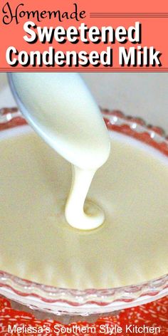 homemade sweetened condensed milk is being poured into a glass dish with a white spoon