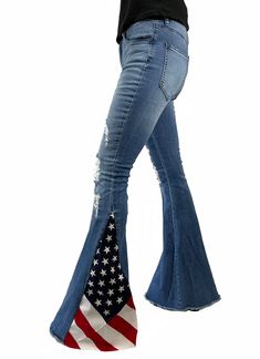 Flag flare denim bell bottom flare jeans are made of 98% cotton and 2% spandex. These are vintage inspired and showy. They are super comfortable and have some stretch to them. The size runs a little on the small side. Model is 5'7" 35-25-38 wearing a size small. Rise: 10” (approx.) Inseam: 33” (approx.) Slight stretch Zip-fly closure Front pockets Back pockets Flared leg Frayed hem Small 0/2/4 waist 25" to 27" Medium 4/6/8 waist 27" to 29" Large 8/10/12 waist 29" to 31" MADE IN THE U.S.A. Our gu Striped Flare Pants, Fringe Pants, Cute Fit, Fit Ideas, Bell Bottom, Denim Flares, Country Outfits, Women Clothing Boutique, Made In America