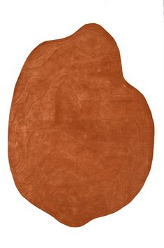 an orange rug on a white background with the shape of a heart in the center