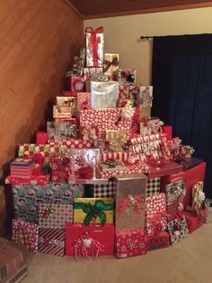 a christmas tree made out of wrapped presents