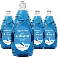 three bottles of dish soap sitting next to each other