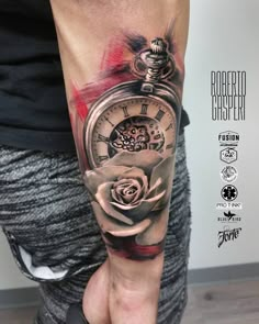 a man's arm with a clock and rose tattoo on it