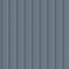 a blue wall with vertical lines on it