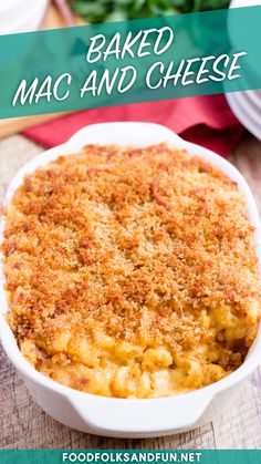 macaroni and cheese casserole in a white dish on a wooden table