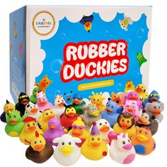 rubber ducks are in front of a box with the words rubber duckies on it