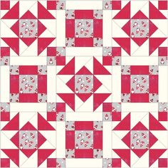 a red and white quilt is shown