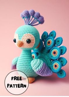 a crocheted blue bird with purple feathers on its tail and the words free pattern below it