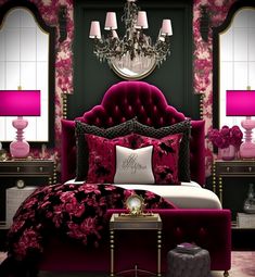 a bedroom decorated in pink and black with a chandelier over the headboard