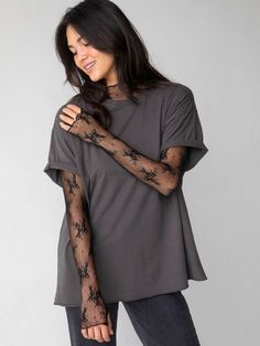 We're OBSESSED with the sheer, lace details! Looks sooo cute under our sweaters, dresses, and jumpsuits! Sheer Long Sleeve Top Under Shirt, Sheer Sleeves Top Outfit, Layered Sheer Top, Layering T Shirts Long Sleeve, Lace Long Sleeve Under Shirt, Mixing Textures Fashion, Lace Shirt Layering Outfit, Sheer Undershirt Long Sleeve Outfit, Lace Turtleneck Top Outfit