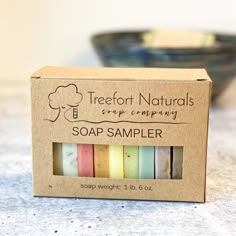 a box of soap samples sitting on a counter