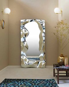 a large mirror sitting in the middle of a living room