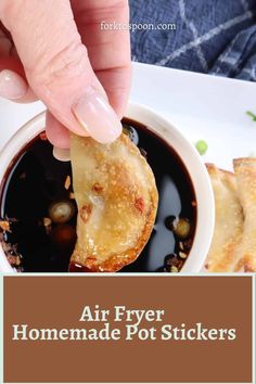 air fryer homemade pot stickers in a white bowl with sauce on the side