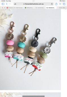 several different types of keychains are shown in the same image, and one is made out of wood