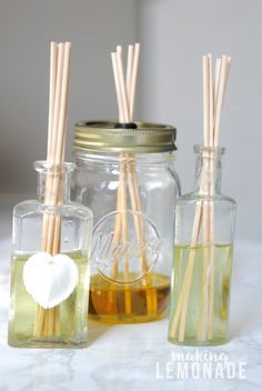 diy natural reed diffusers in mason jars with cotton swabs and lemonade