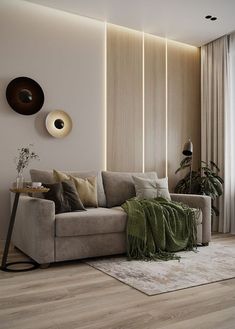 a living room filled with furniture and a large window covered in curtains next to a wooden floor