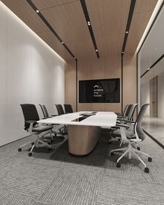 an empty conference room with black and white chairs