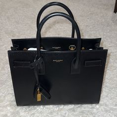 Black Smooth Leather - New With No Wear And Tear. Dust Bag, Removable Crossbody Strap, Lock & Key, Paper Stuffing All Included. Office Handbags, Ysl Bags, Yves Saint Laurent Bag, Ysl Purse, Luxury Bags Collection, Cheap Bags, Yves Saint Laurent Bags, Saint Laurent Shoes, Big Bags