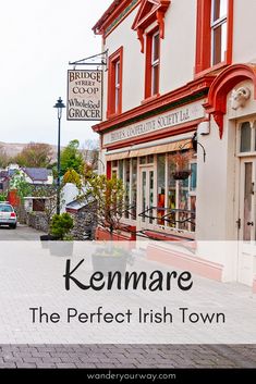 the words kenmare are in front of an image of a street with cars parked on it