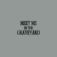 the words meet me in the graveyard are black and white, against a gray background