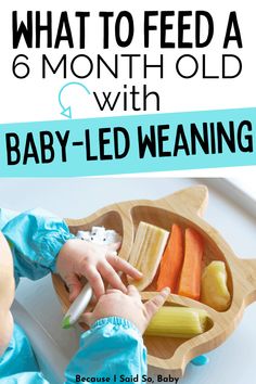 a baby is playing with food in a wooden tray that says, what to feed a 6 month old with baby - led weaning