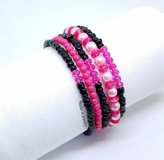 Black And Hot Pink Bracelet Set, Bright Pink Stretch Bracelets, 5 Loose Black Bracelets, Girly Pink Bracelets, Fuchsia Bracelets 4mm black glass with hot pink crystals and resin bead stretch bracelet. Comfortably fits a 7" wrist. You will receive 5 bracelets. #B299 Wanna See More? Click below for other items available: Add On Layering Necklaces: https://www.etsy.com/shop/StudioMJewelry?section_id=42768641 Single Strand Necklaces: https://www.etsy.com/shop/StudioMJewelry?section_id=42768683 Multi-Strand Necklaces: https://www.etsy.com/shop/StudioMJewelry?section_id=42756488 Big & Bold Jewelry: https://www.etsy.com/shop/StudioMJewelry?section_id=42768649 Bracelets: https://www.etsy.com/shop/StudioMJewelry?section_id=42769605 Charm & Bangle Bracelets: https://www.etsy.com/shop/StudioMJewelry? Hot Pink Bracelet, Hot Pink Bracelets, Pink Bracelets, Girly Bracelets, Black And Hot Pink, Layering Necklaces, Bold Jewelry, Bangle Bracelets With Charms, Black Bracelets