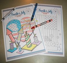 two coloring pages with colored pencils on top of them and fireworks in the background