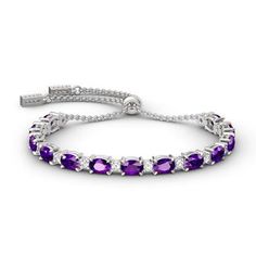 So glamorous, this on-trend bracelet elevates your attire. Fashioned in sterling silver, this impressive design features alternating purple stones and smaller white stones. Elegant and unique, you can wear one, two or more bolos together to create a look all your own. A great anytime choice, this fashion bracelet is sure to become an instant favorite. Carat Weight: 11.48 ctStone Shape: Oval, RoundStone Size: 4*6,2.8 mmNumber of Stones: 27 Stone Color: Amethyst Purple, Diamond WhiteWeight: 11.5 g Sincere Love, Jeulia Jewelry, Trending Bracelets, Sterling Silver Rings Set, White Stones, Silver Ring Set, White Bracelets, Love Bracelet, Silver Charm Bracelet