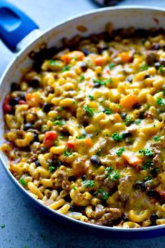 a skillet filled with macaroni and cheese