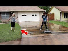 two people in front of a house with a pressure washer on the driveway and an arrow pointing to the right