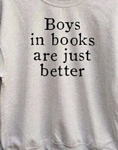 a white sweatshirt with the words boys in books are just better printed on it