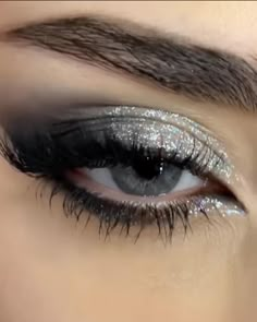 Black Eyeshadow Looks With Glitter, Siren Eyes Eyeshadow, Smokey Eyeliner With Glitter, Black Sparkly Eyeshadow, Grey And Silver Eyeshadow, Black And Silver Makeup Ideas, Dark Glitter Makeup Looks, Silver Glitter Eyeliner Looks, Star Glitter Eye Makeup