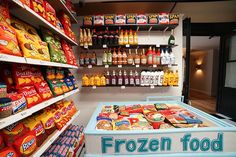 the frozen food section of a grocery store