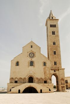 an old church with a large clock tower