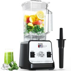 a blender filled with lots of fruit and vegetables