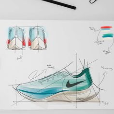 a pair of nike shoes is drawn on a piece of paper with markers and pencils