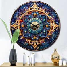 a decorative clock is on the wall next to some vases and a potted plant