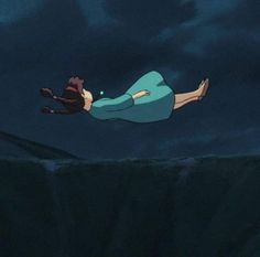 a woman floating in the air on top of a cliff under a dark sky with clouds